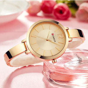 Relógio feminino dourado Ultra fino