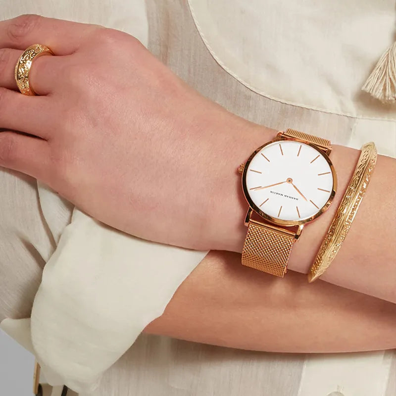 Relógio feminino dourado minimalista